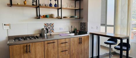 Fridge, microwave, coffee/tea maker, blender