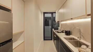 Presidential Suite, 2 Bedrooms, Club lounge access, City View | Private kitchen | Full-sized fridge, microwave, oven, stovetop