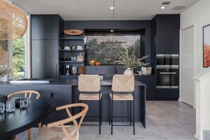 Fridge, oven, dishwasher, coffee/tea maker