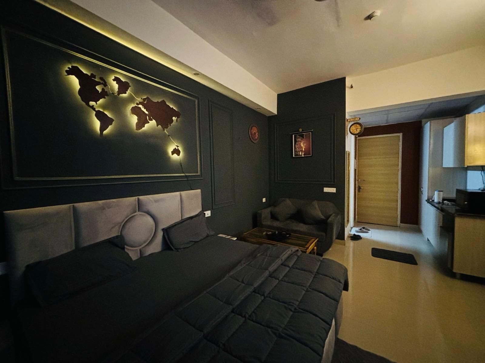 Luxury Studio Suite, Balcony, City View | In-room safe, desk, laptop workspace, blackout drapes