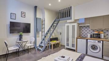 1 bedroom, desk, iron/ironing board, travel crib