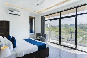 Deluxe Suite, Balcony, Hill View | Desk, laptop workspace, soundproofing, iron/ironing board - Sasa Resort (Udaipur)