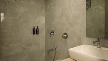 Shower, free toiletries, towels, soap