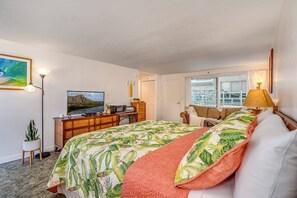 1 habitación, tabla de planchar con plancha y ropa de cama