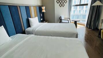 Deluxe Double or Twin Room, Pool View | In-room safe, iron/ironing board, free WiFi