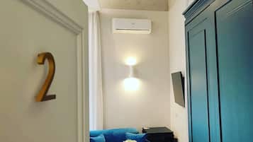 Deluxe Triple Room, Non Smoking, Balcony | In-room safe, desk, free WiFi
