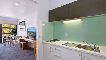 Microwave, coffee/tea maker, toaster, dining tables