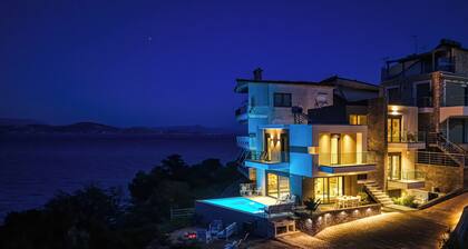 A luxurious specious 4 bedroom 3.5 bathrooms sea front modern villa