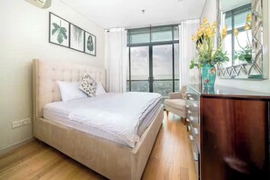 Familjesvit - 3 sovrum - tillgång till Club Lounge - utsikt mot staden | Egyptiska bomullslakan, sängtillbehör av högsta kvalitet och duntäcken