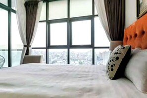 Suíte família, 3 quartos, acesso ao Club Lounge, vista para a cidade | Vista do quarto