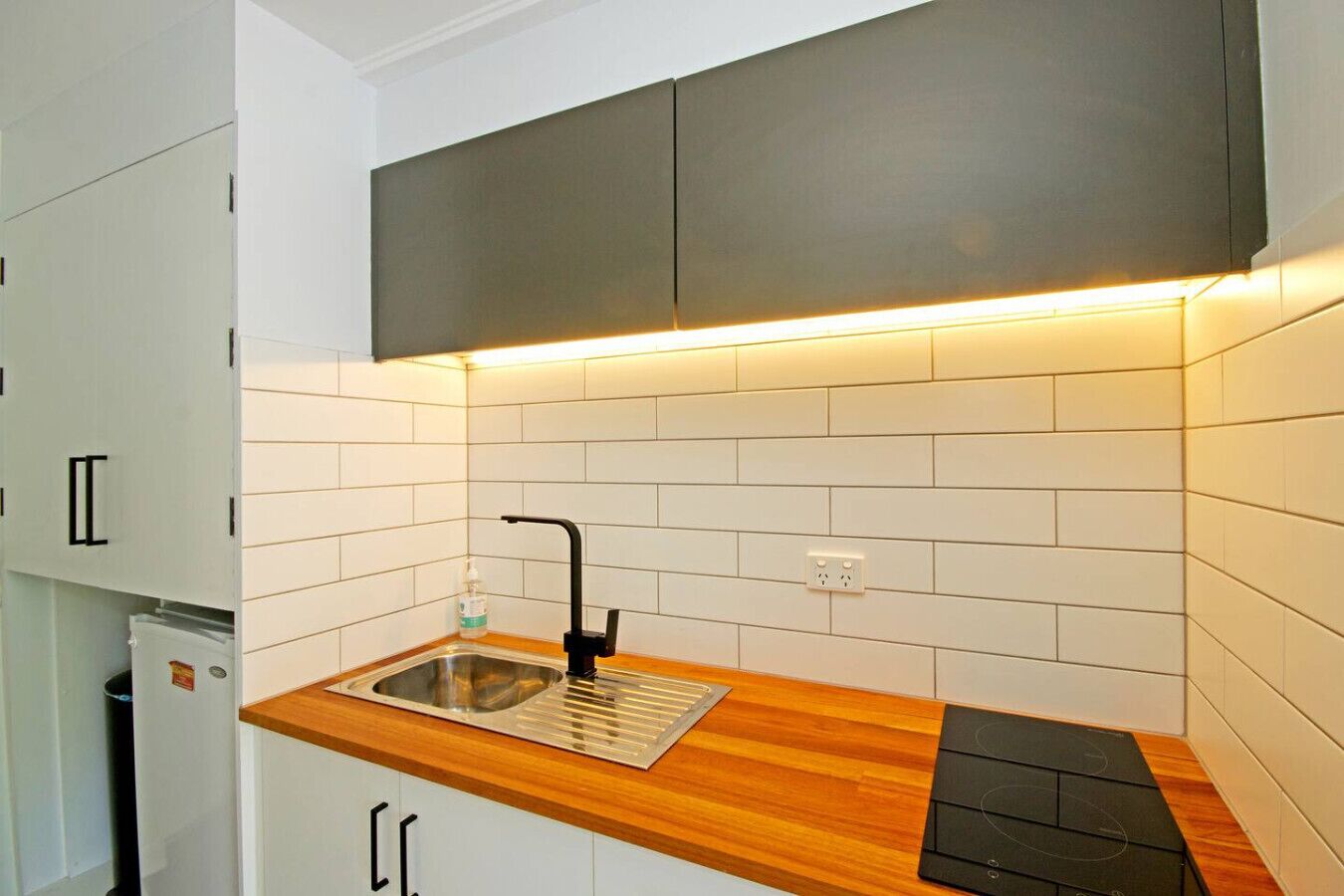 Microwave, coffee/tea maker, toaster, dining tables