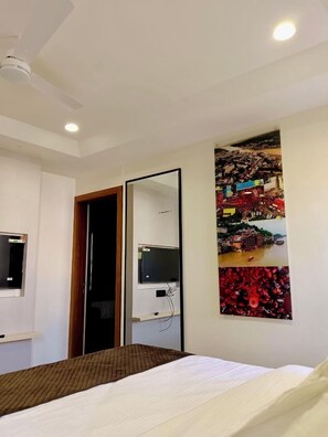 In-room safe, desk, laptop workspace, blackout curtains - Namami Retreat (Omkareshwar)