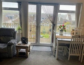 Shared Dormitory, 1 Bedroom, Smoking, Balcony | Living area | Books - Room-cosy Beach Getaway on Edge of South (Brighton)