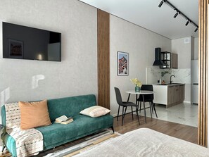Living area - "Secret Garden" enjoyable 1-bedroom apartment near Arbat (Almaty)