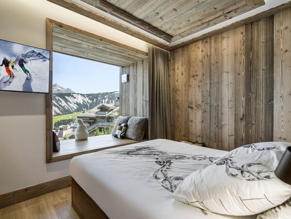 2 bedrooms, free WiFi, bed sheets - 47m² Apartment in Courchevel 1850, ski-in/ski-out for 4 (Courchevel 1850)