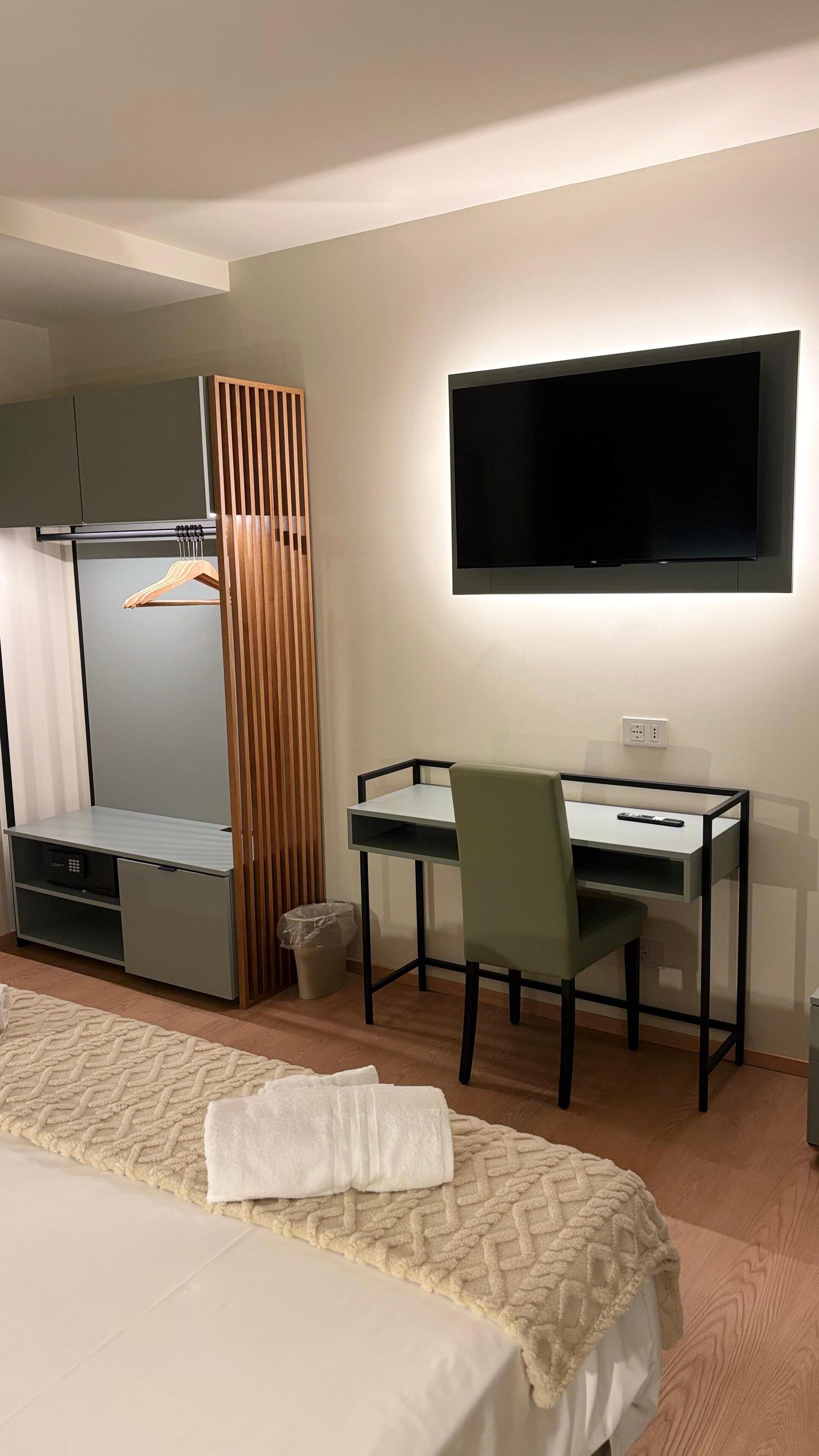 Deluxe Double Room, Balcony, City View | In-room safe, desk, blackout drapes, soundproofing