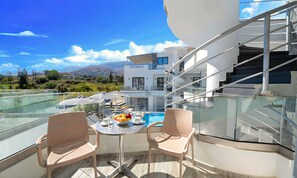 Suite Confort, vue piscine | Vue de la chambre