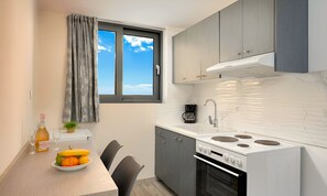 Suite Confort, vue piscine | Coin cuisine privé