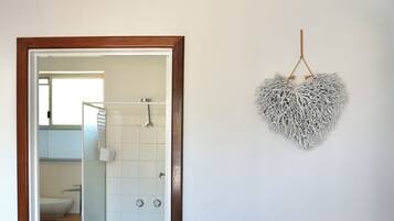 Hair dryer, towels, soap, shampoo