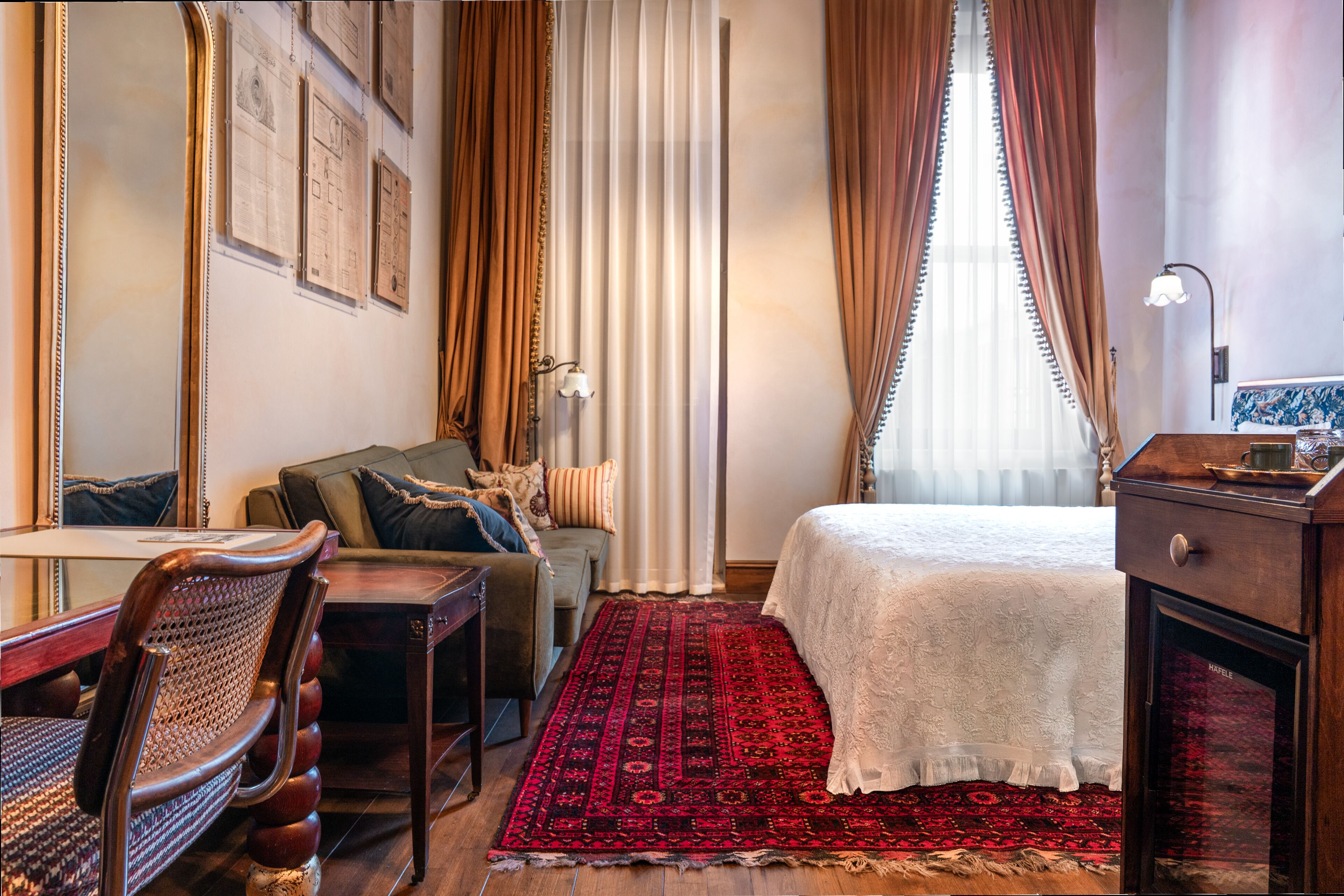 Deluxe Room, Courtyard View | In-room safe, desk, laptop workspace, blackout drapes