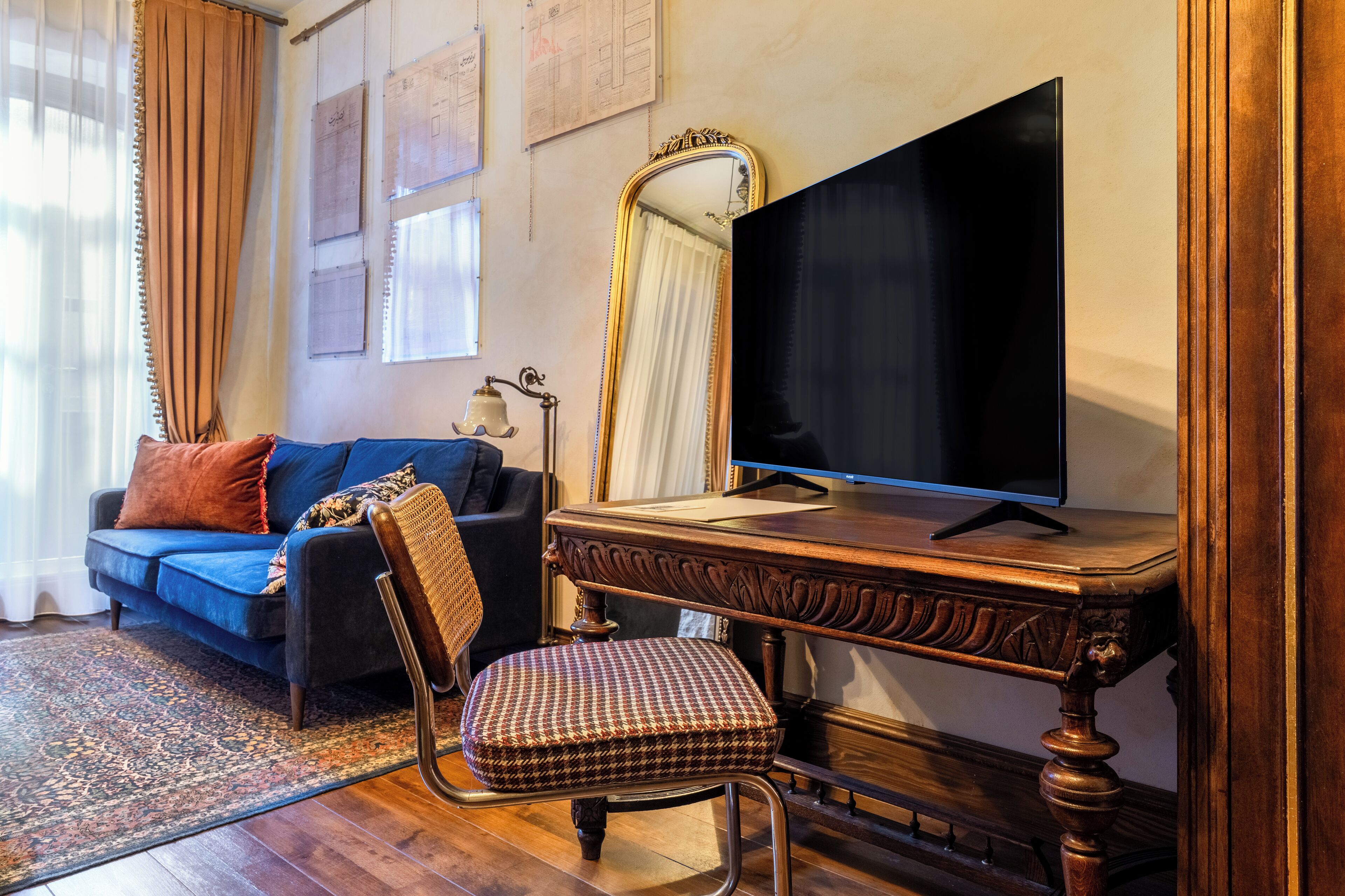 Deluxe Room, Balcony, Courtyard View | In-room safe, desk, laptop workspace, blackout drapes