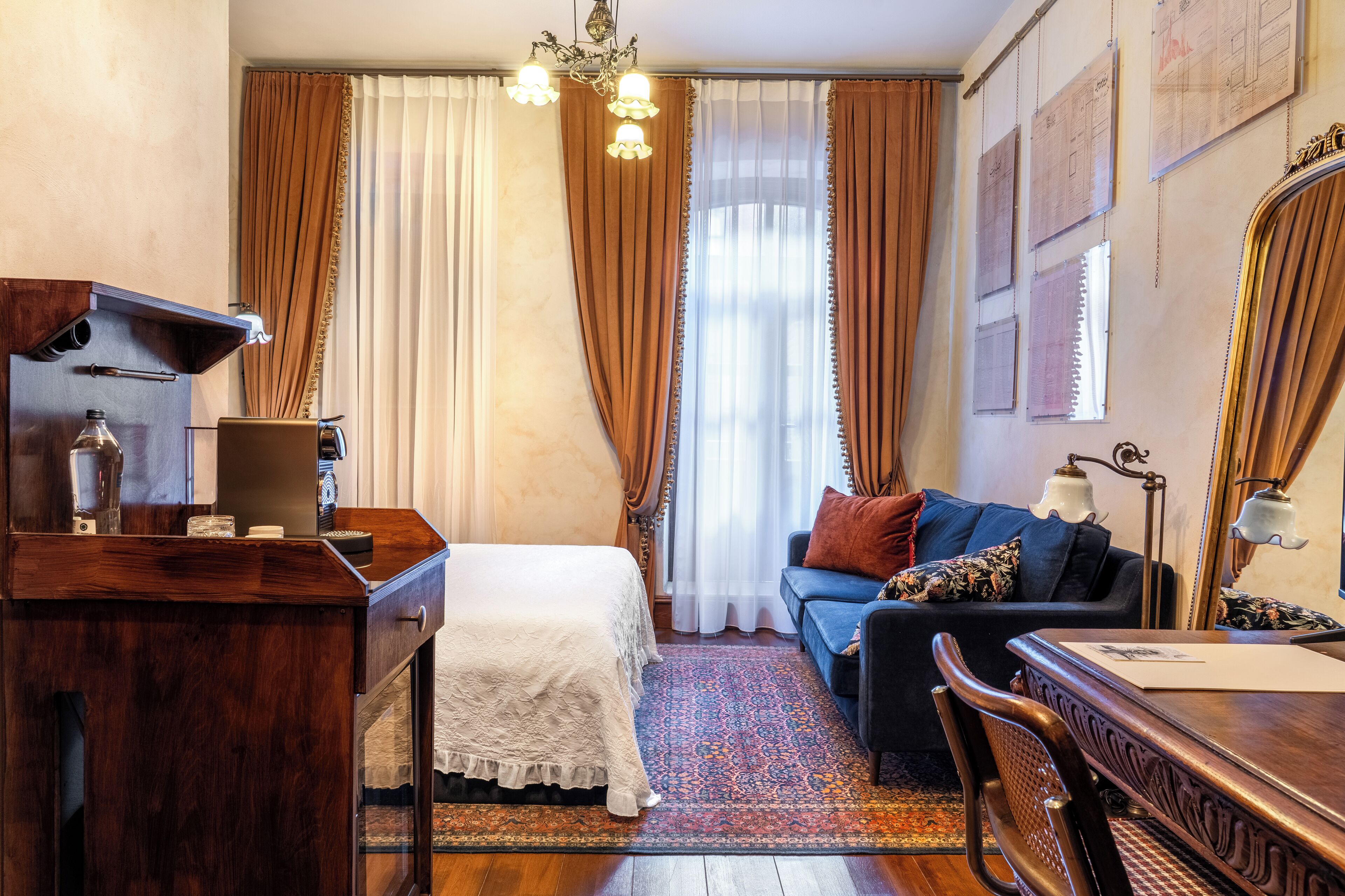 Deluxe Room, Balcony, Courtyard View | In-room safe, desk, laptop workspace, blackout drapes