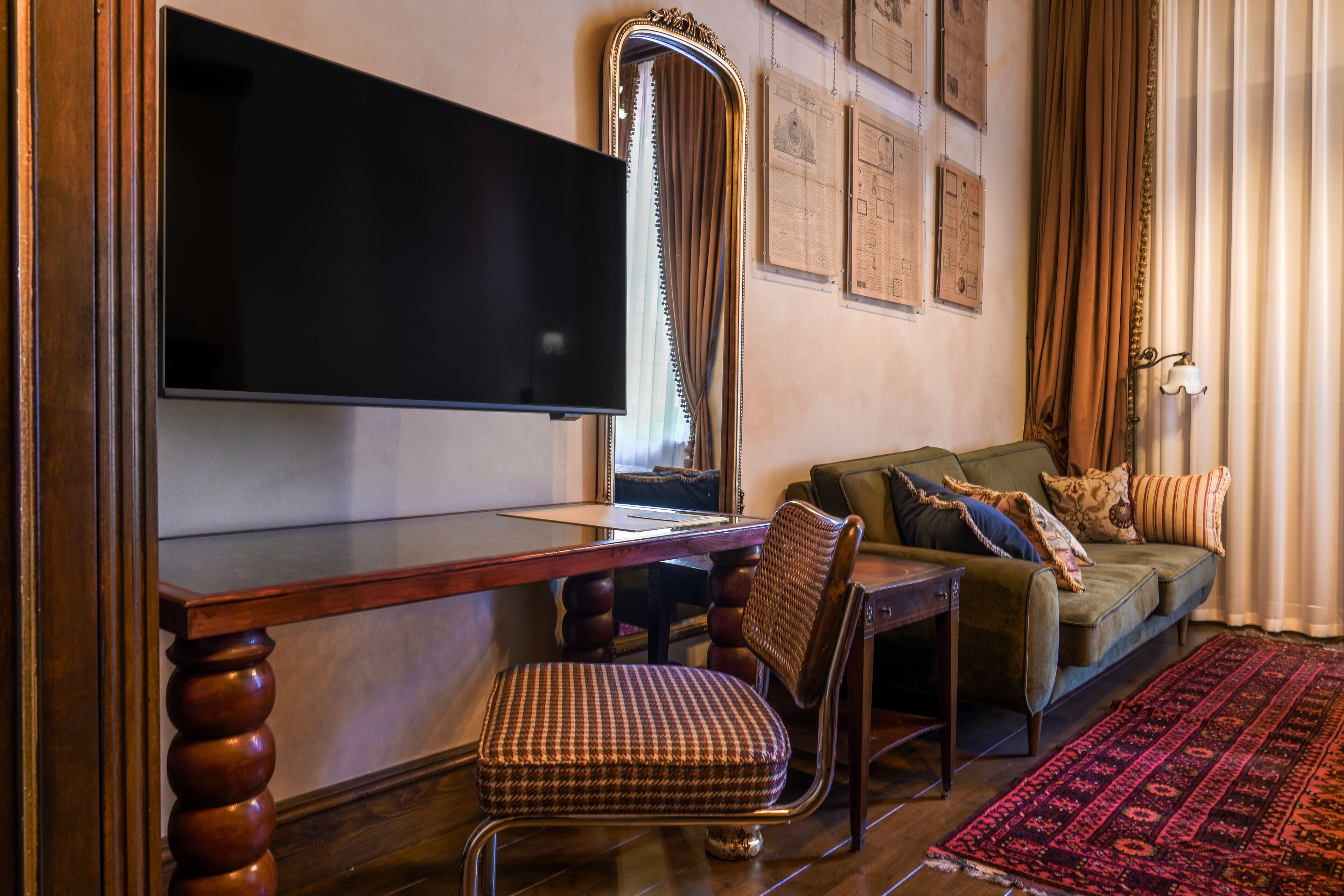 Deluxe Room, Courtyard View | In-room safe, desk, laptop workspace, blackout drapes