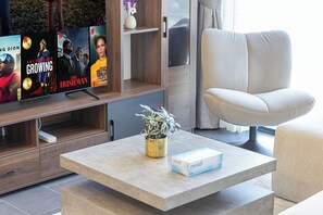 Luxury Apartment, Balcony, City View | Living area - Sobha Suites by Hostiva - Burj View (Dubai)