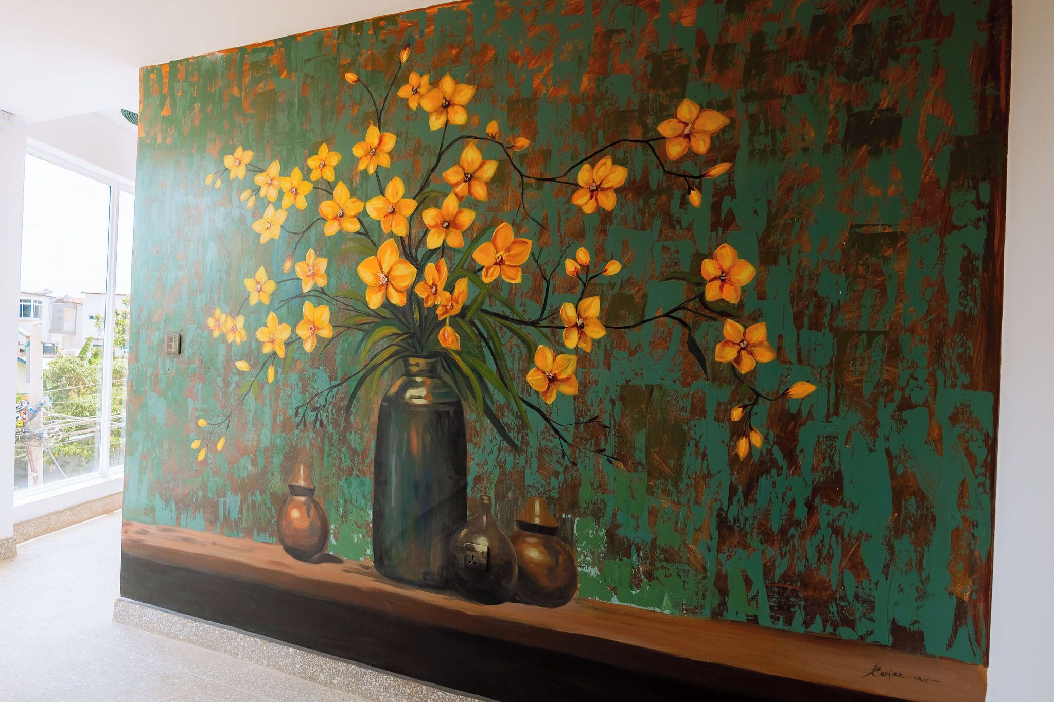 A large painting of yellow flowers and vases on a wall.