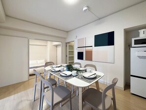 Japanese-style Apartment , Balcony | Living area | 55-inch Smart TV with cable channels - Dai3Kuboi 405 (Hiroshima)
