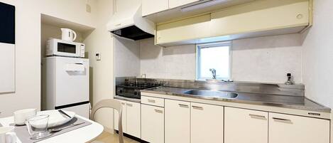 Japanese-style Apartment, Balcony | Private kitchen | Electric kettle