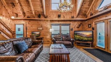 Cabaña, 5 habitaciones | Zona de estar | Una Smart TV