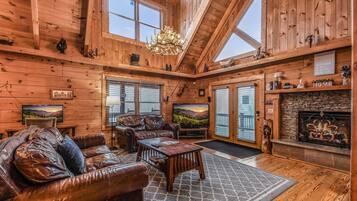 Cabaña, 5 habitaciones | Zona de estar | Una Smart TV