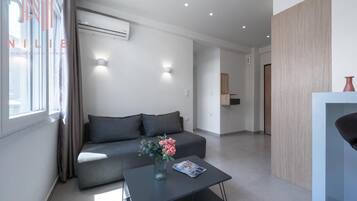 Apartamento standard | Área de estar | Smart TV