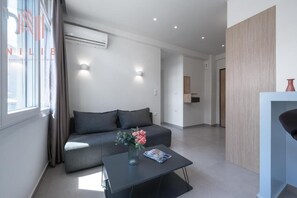 Apartamento standard | Área de estar | Smart TV