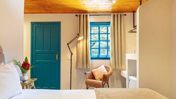 Suíte superior, vista para o jardim | Wi-Fi de cortesia