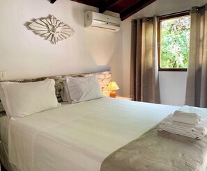 Suite estándar, vista al jardín | Wifi gratis