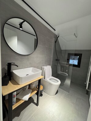 Shower, hair dryer, towels, soap