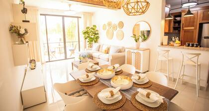 Tropical Getaway with pool & steps to the beach