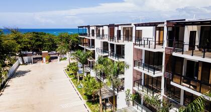 Tropical Getaway with pool & steps to the beach