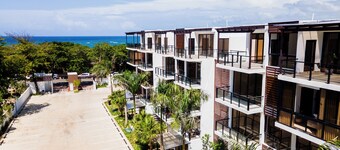Tropical Getaway with pool & steps to the beach