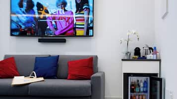 Quadruple Room, Balcony, City View | Living area | Printers