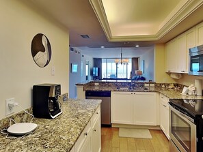 Fridge, microwave, oven, stovetop - Sun Caper 505 | Water Views + Resort Amenities (Fort Myers Beach)