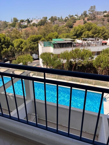 Bright apartment, private terrace and swimming pool