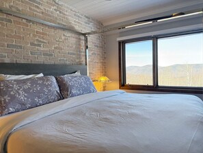 1 bedroom, desk, iron/ironing board, travel cot