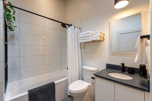 Hair dryer, towels, soap, toilet paper