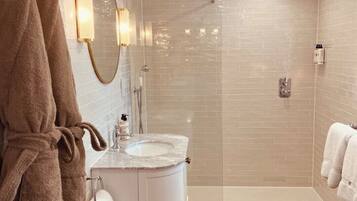 Shower, eco-friendly toiletries, hair dryer, towels
