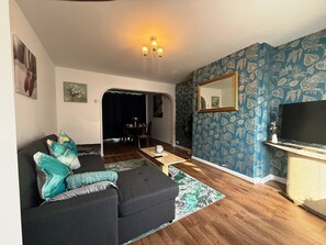 Ferienhaus, 3 Schlafzimmer, Terrasse, Gartenblick | Wohnbereich