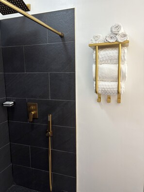 Shower, hair dryer, towels, soap