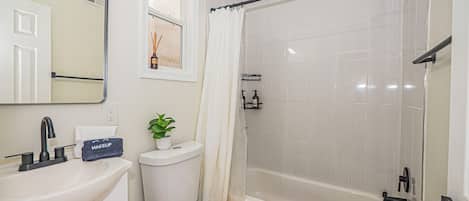 Bidet, towels, toilet paper